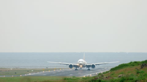 Airplane landing in the distance