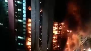 Building Catches Fire and Collapses