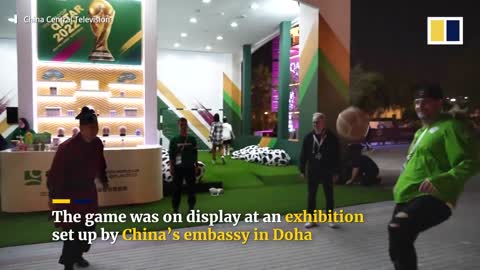 Ancient Chinese form of football showcased on sidelines of Qatar World Cup 2022
