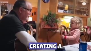 Grandpa and granddaughter create a wholesome bond through song.