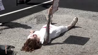 GROSS! Abortion Activist with Red Stain on Crotch Lies in Front of Supreme Court