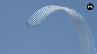 The Snowbirds fly over Toronto as part of the Canadian International Air Show