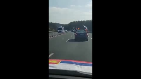 Citizens of Bavaria Region, in Southern Germany waving Russian Federation FRG/German Federal Flags