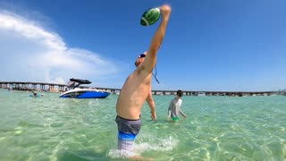 Throwing the Football at Crab Island With my Brother