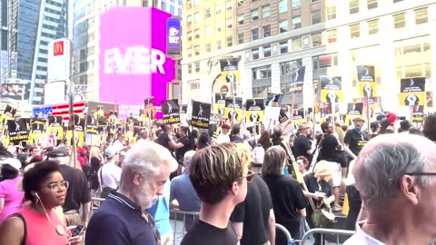 Striking writers and actors rally in New York's Times Square