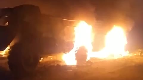 Ukrainian Locals Destroy Russian Carrier with Molotov Cocktails