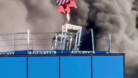 Crane operator saves person from fire 🏗️👨‍🚒 #HeroicRescue #CraneOperator #FireSafety