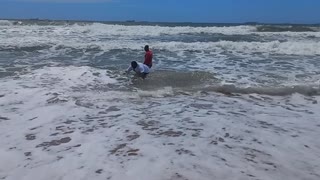 Durban mayor Mxolisi Kaunda, deputy city manager Gumede take a dip at eThekwini beaches