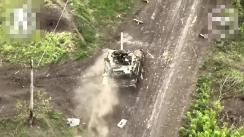 A Russian T90 tank hit by 2 unmanned military aviation, goes on with mission