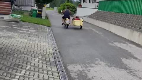 Old school motorcycle with Sidecar - happiness