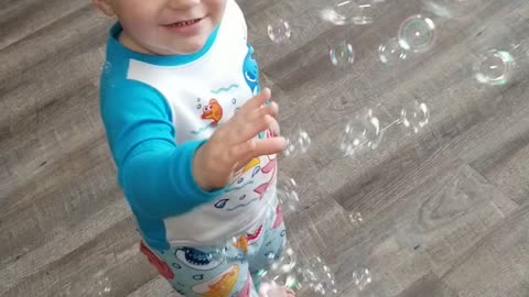 baby and bubbles