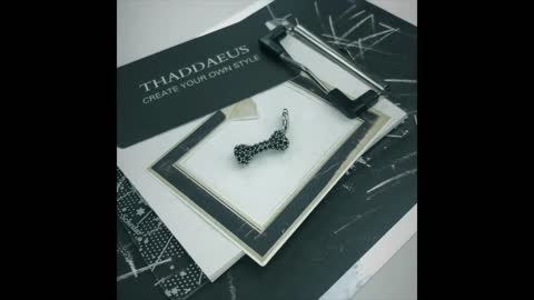 Studded Black Dog Bone Silver Pendant