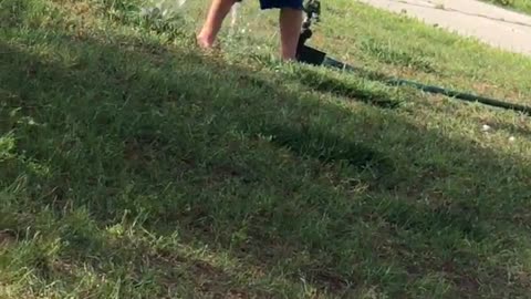 3 Year Old Boy Does Questionable Things With Sprinkler