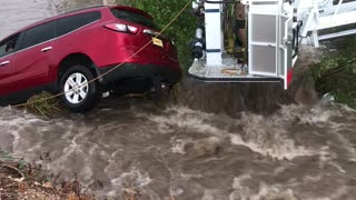Portales Fire Department Saves Family From Car Swept by Floodwaters