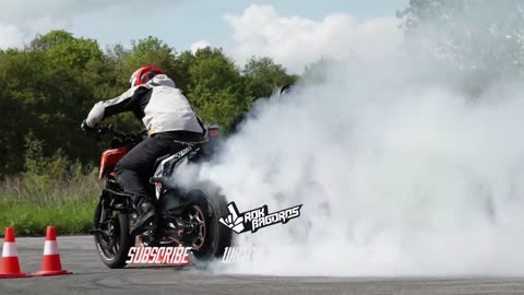 "High-Octane Showdown: Moto Drift Battle featuring Stunt Sensation Sarah Lezito - KTM vs. Kawasaki"