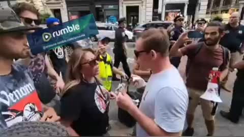 Man eats meat in front of a vegan's march in NY