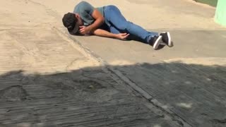 Skater runs onto skateboard and falls