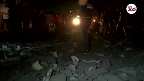 Israeli airstrikes demolish Gaza tower block before Hamas fires 130 rockets