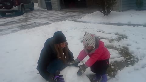 Emma and Aunt Shayleigh play in snow #3