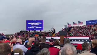 Crowd sing the Star Spangled Banner