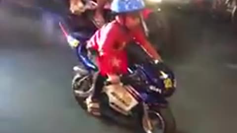 Cute racing kid boy in vietnam