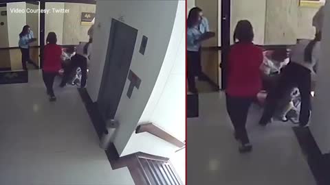 Courageous mom saves toddler from falling of the building.