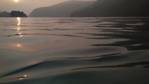 Fewa lake boating ! Sunrise view in the morning - Winter, Nepal.
