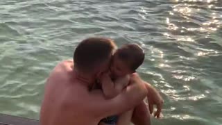 Fearless toddler loves to jump in the water