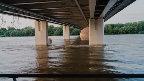 Planets Float by Under Bridge