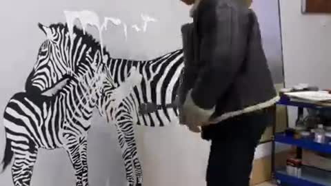 Man Painting Realistic Rhinoceros