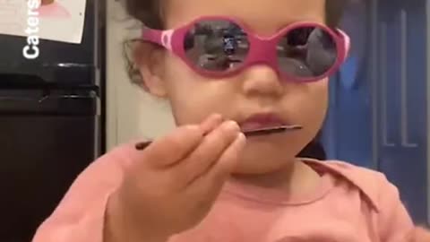 Adorable moment partially blind baby girl puts special glasses on for the first time