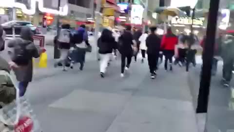 MANHOLE EXPLOSION CAUSES PANIC IN NEW YORKS TIME SQUARE - ANGLE 2