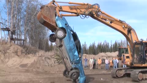 Excavator Destroying Car