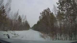 Passing Sledder Unexpectedly Crashes Into Parked Car