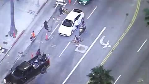 BLM attacks L.A. motorist after car chase.