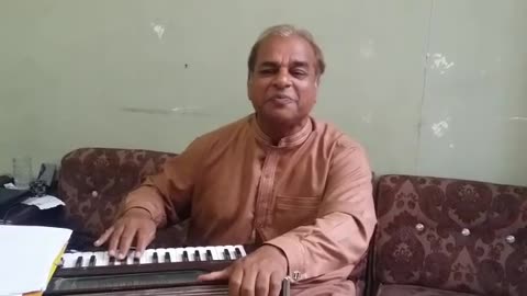 Man singing new indian song at home