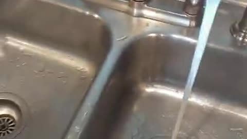 new kitchen sink installed with garbage disposal
