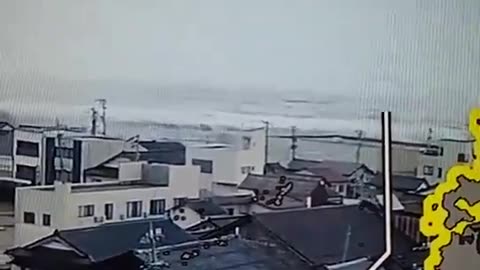Tsunami waves begin to hit the west coast of Japan