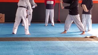 Black belt breaking 1" boards