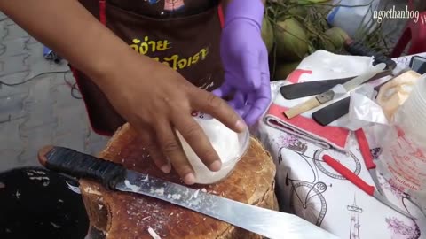 Super nice coconut chopping skills