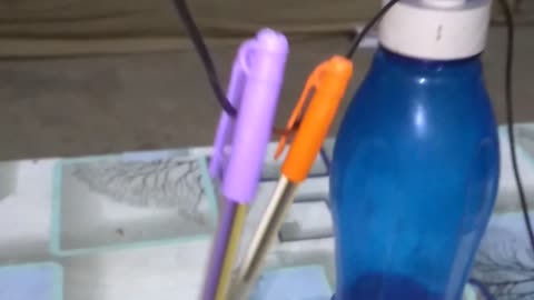 Hanging pen trick