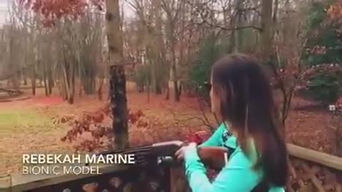 Rebekah Marine shooting a gun with her bionic arm!