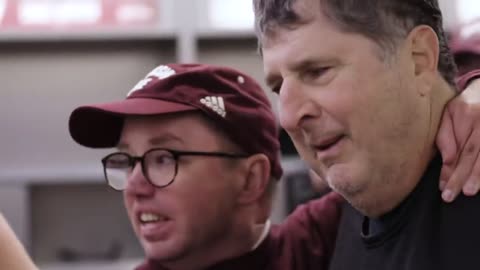 Coach Leach Presents the Game Ball to Special Needs Student at One of His Final Games