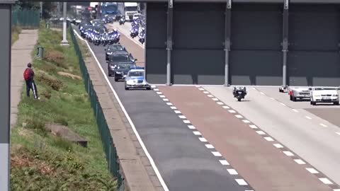 Queen Elizabeth II and Enormous Escort Entourage on a cleared Highway at Frankfurt