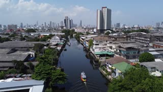 A Single Ferry Boat with a Drone Pilot on the Roof of the Boat in Thailand - Adventure ahead!