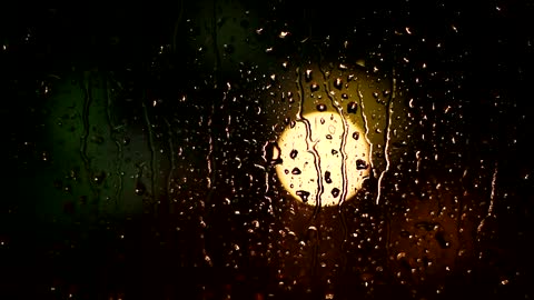 How beautiful rain falls on the window