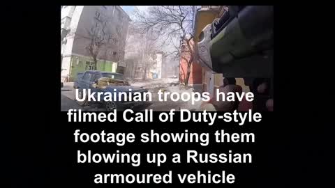 Ukrainian troops showing them blowing up a Russian armoured vehicle