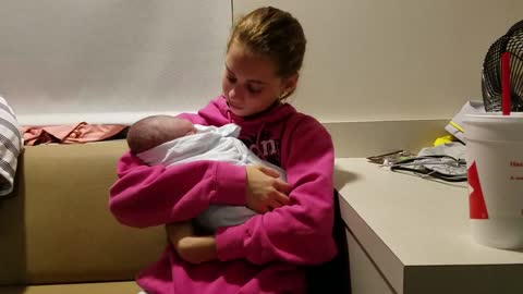 Emotional Big Sister Holds Baby Brother For The First Time
