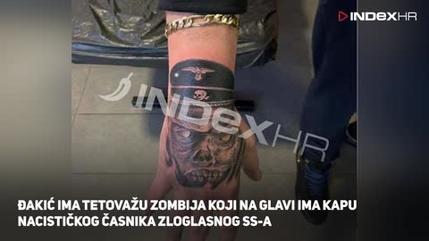 Pogledajte kako Đakićev sin skriva nacističku tetovažu pred novinarima