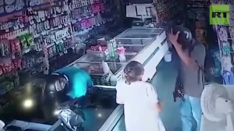 Armed robber kisses elderly woman when she offers to give up her money